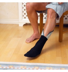 Manga pone calcetines y medias Etac